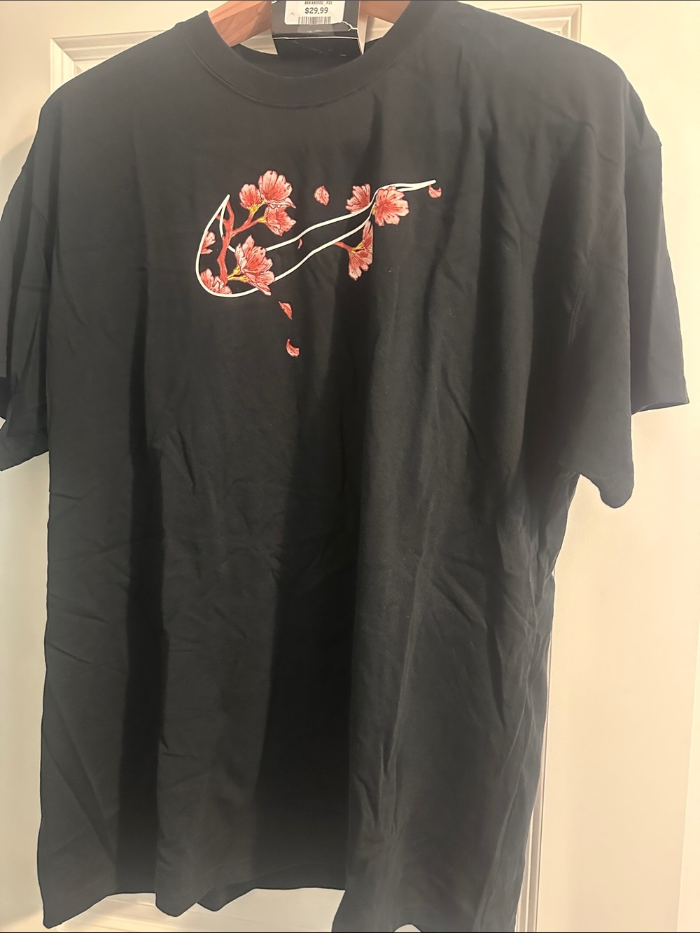 Nike Black Short-Sleeve Tee with Pink Floral Swoosh